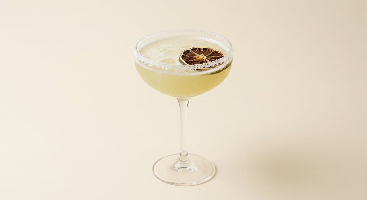 Classic margarita with a dried lime wheel